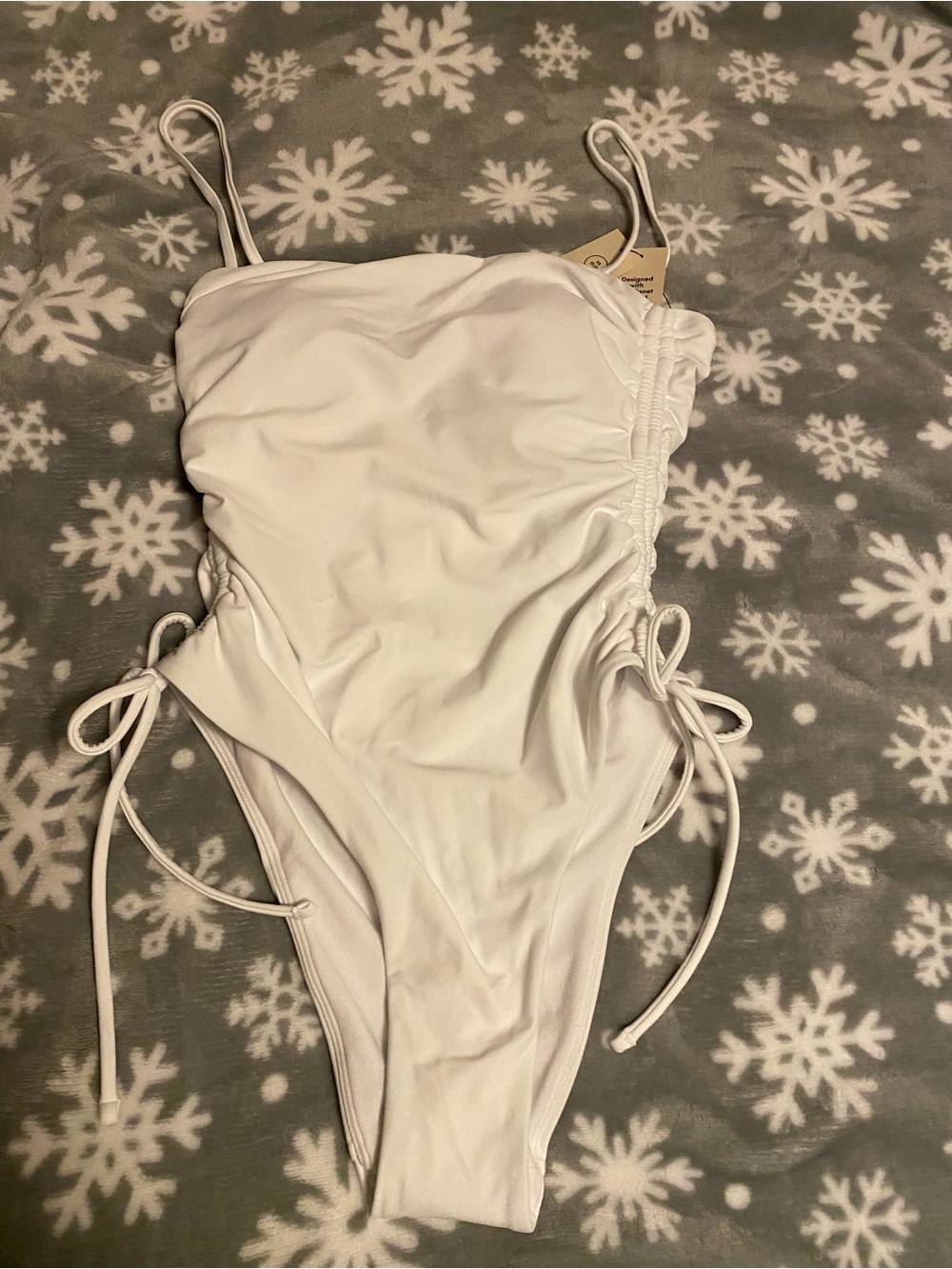 No Boundaries White Ruched One-Piece Swimsuit with Side Ties